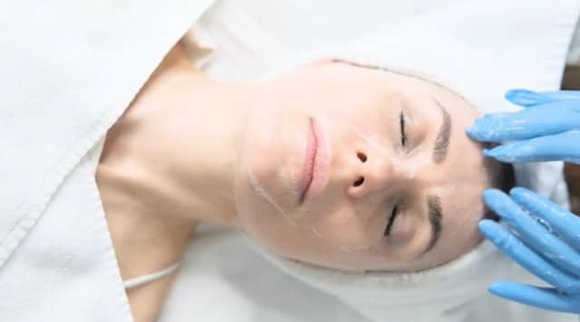 Patient receiving a professional facial